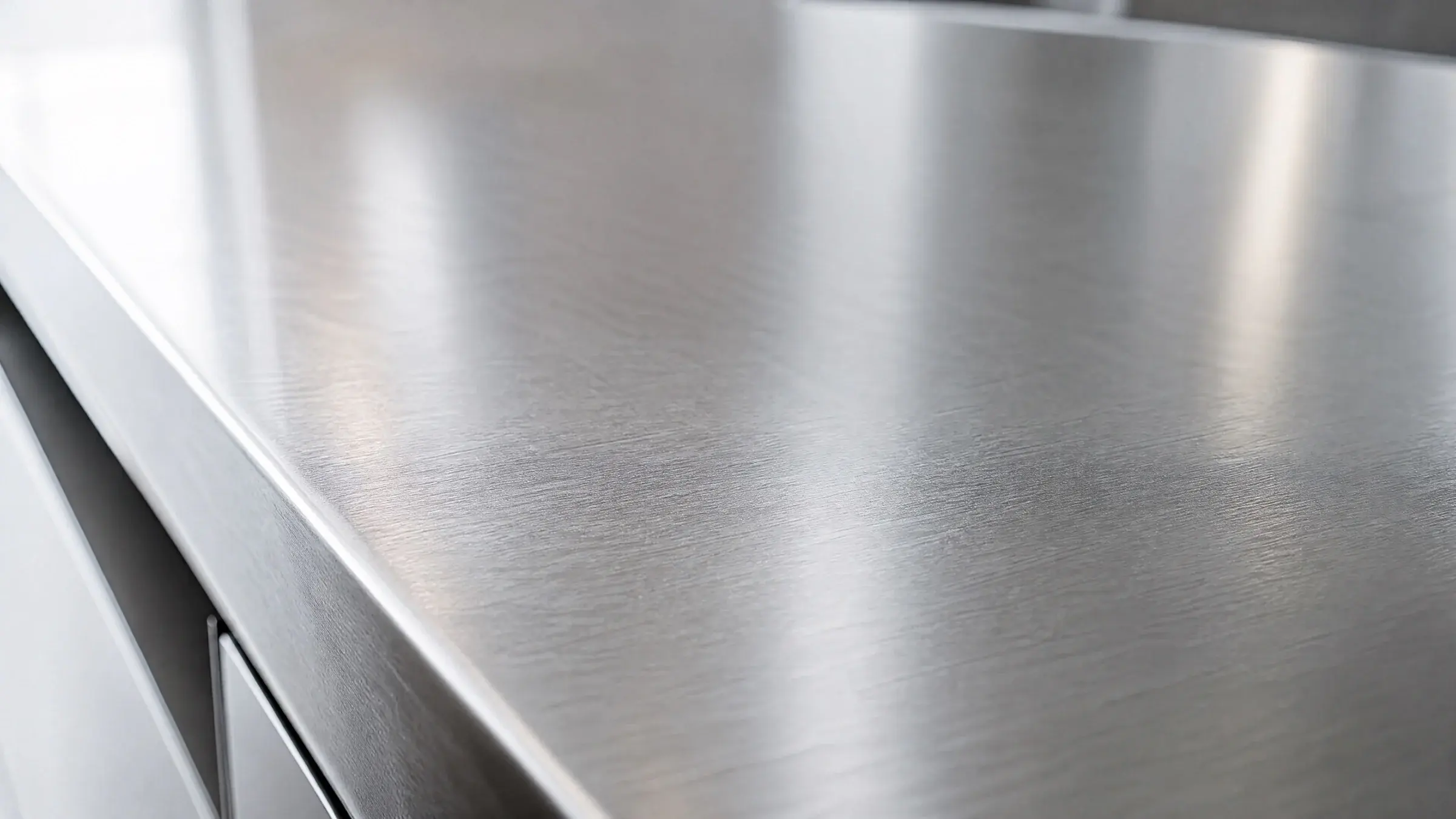 Brushed 321 stainless steel surface in soft natural light
