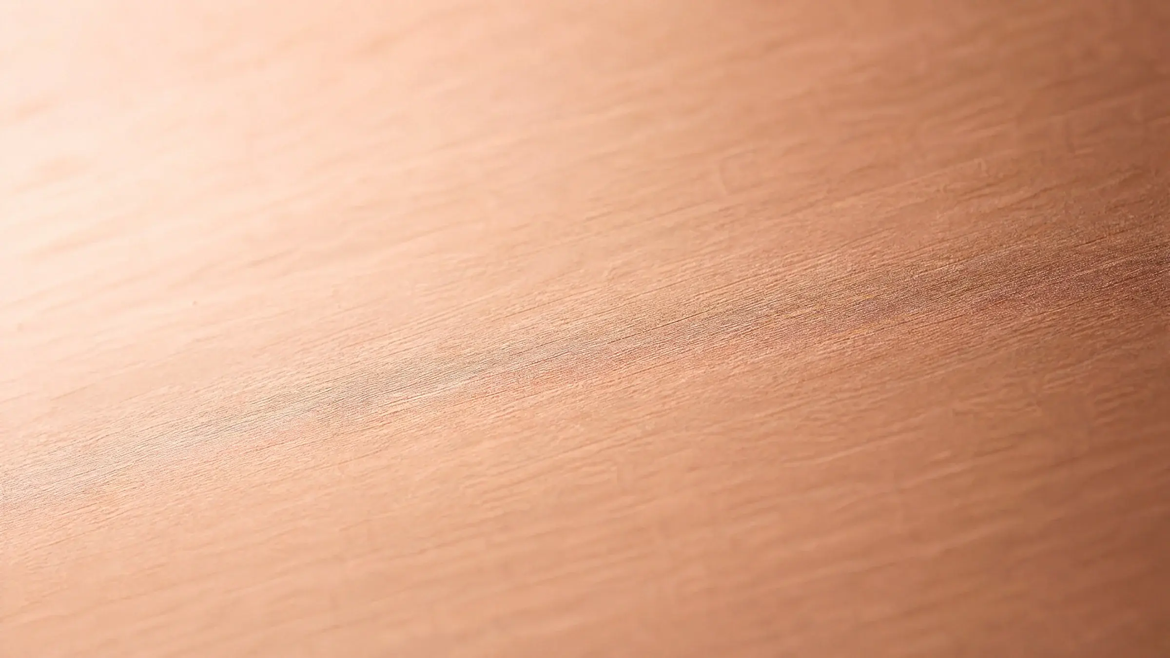 Brushed T2 copper surface in soft natural light