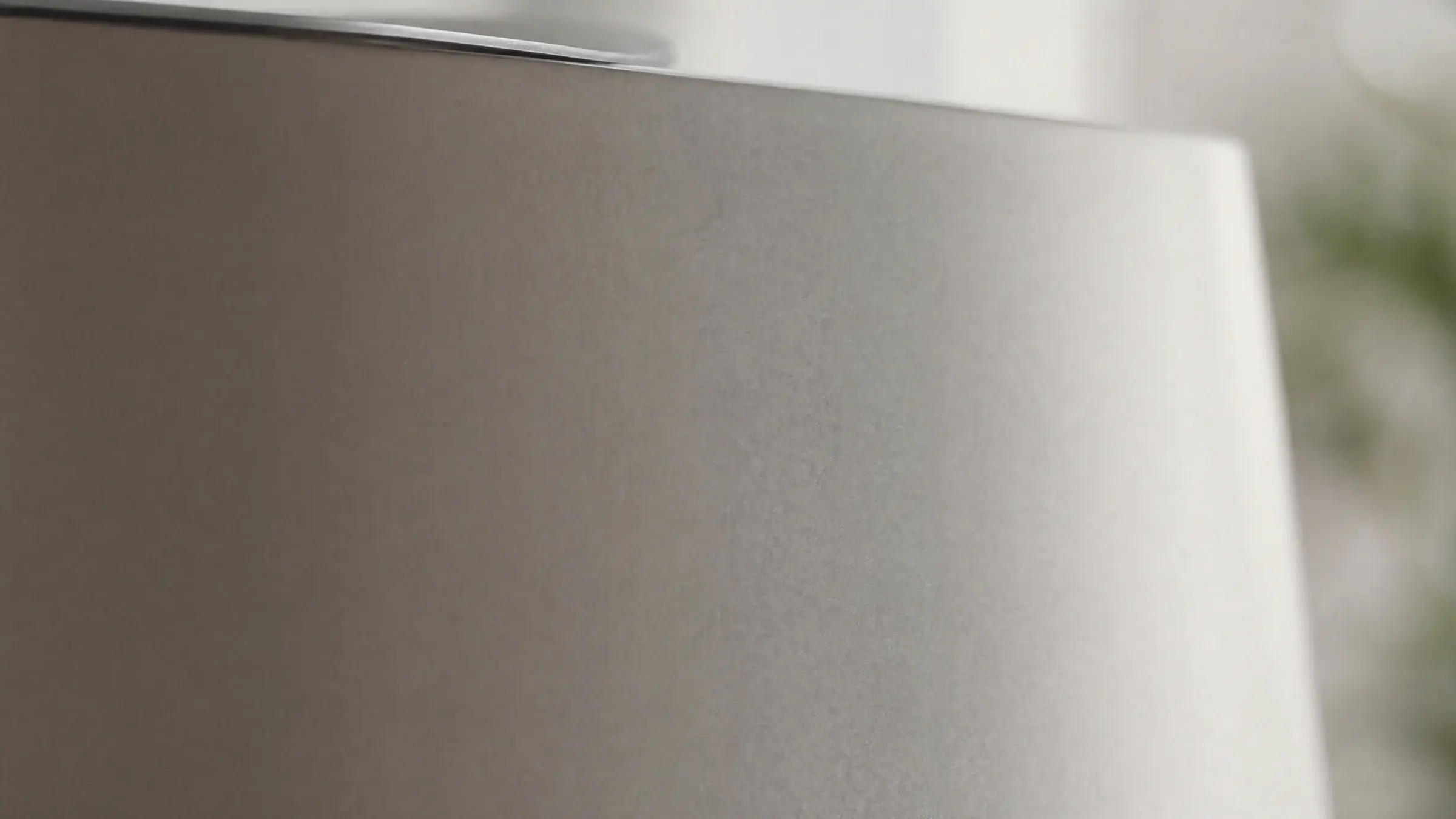 Matte TA1 titanium surface in soft natural light