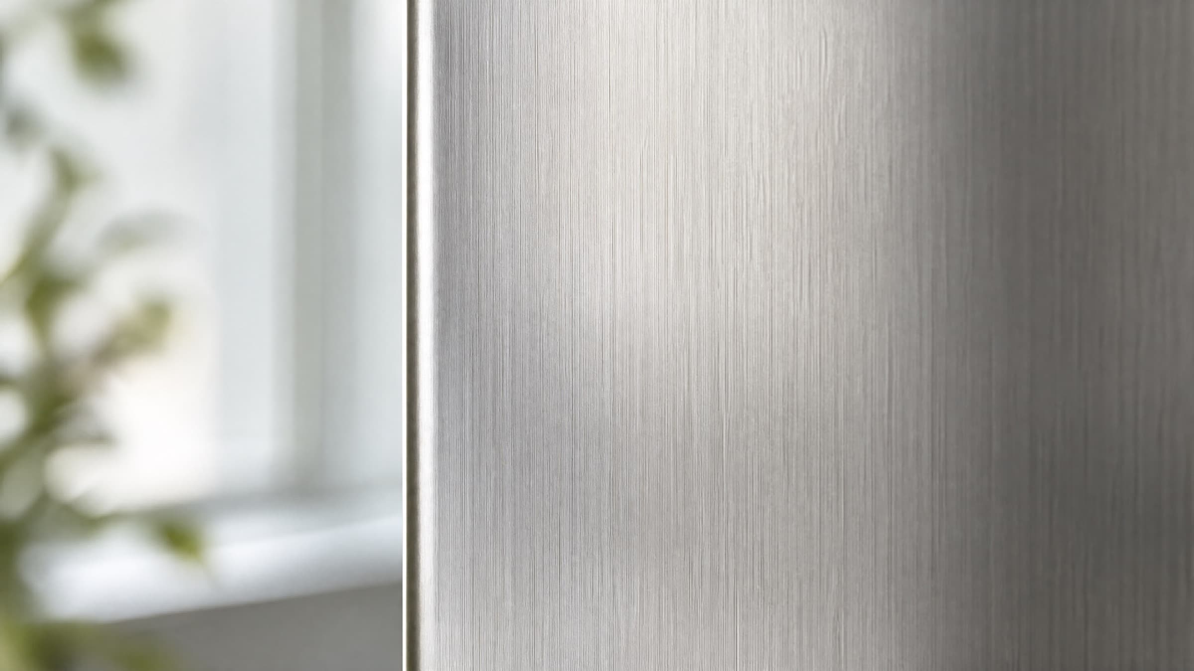 Brushed satin-finish 201 stainless steel decorative panel in soft natural light