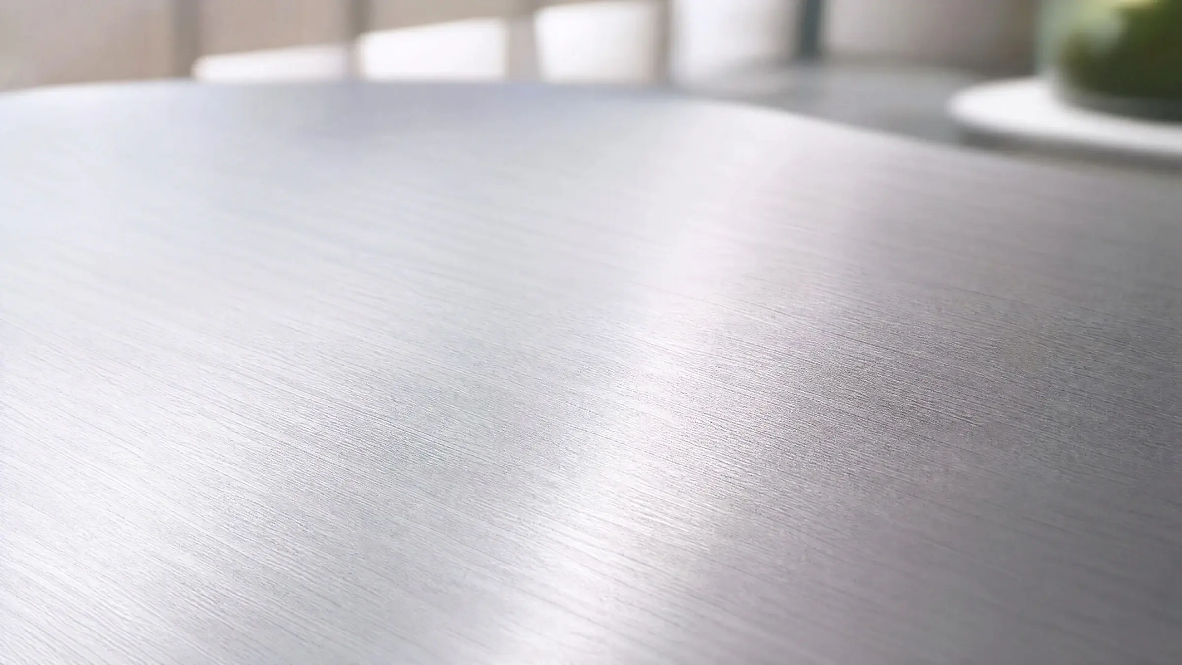 Brushed 3003 aluminium surface in soft natural light