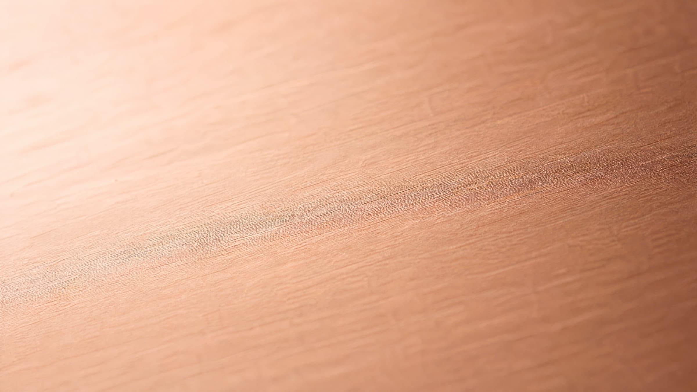 Brushed T2 copper surface in soft natural light