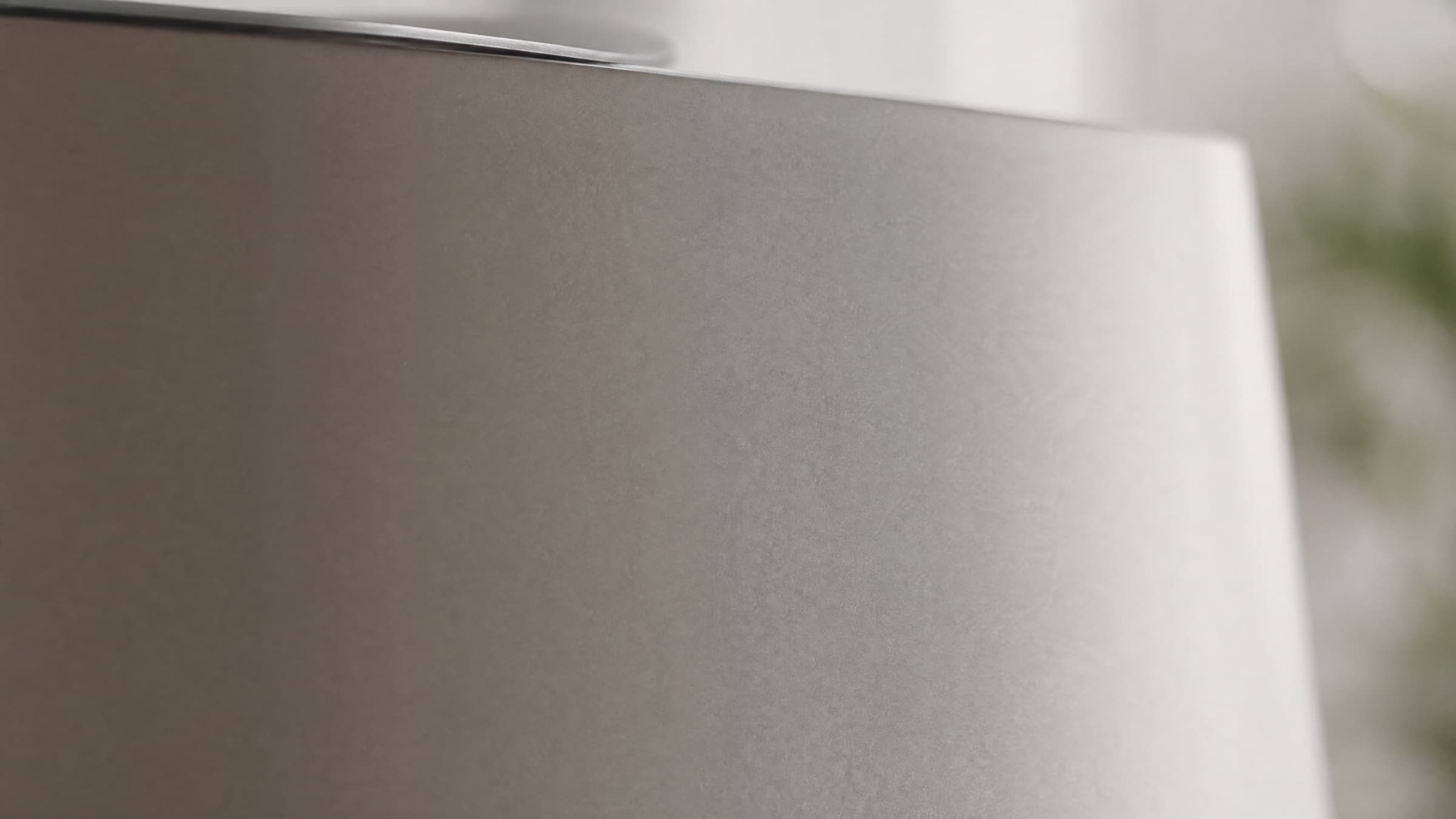 Matte TA1 titanium surface in soft natural light