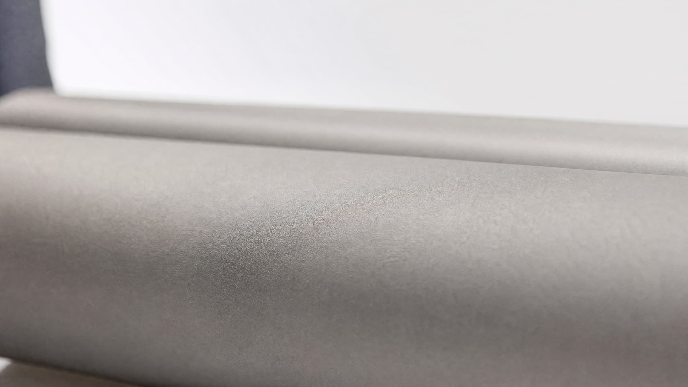 Matte TC4 titanium surface in soft natural light